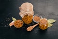 Grain Mustard. Spices On a white wooden background.