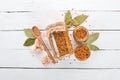 Grain Mustard. Spices On a white wooden background. Royalty Free Stock Photo