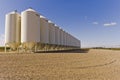 Grain silos under a blue sky