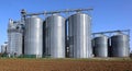Grain storage bins with silos and distribution system Royalty Free Stock Photo