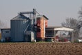 Grain storage silos for animal use with stable Royalty Free Stock Photo