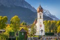 Grainau Church at golden autumn and Zugspitze, Garmisch Partenkirchen, Germany