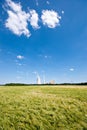 Grainfield and power plant Royalty Free Stock Photo