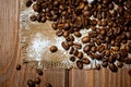 Grains of black coffee lying on a rough canvas. Background for coffee drinks Royalty Free Stock Photo
