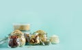 Grains, cereals, nut, dry fruits in glass jars over blue background with copy space. Clean eating, healthy, vegan diet concept Royalty Free Stock Photo