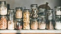 Grains, cereals, nuts, dry fruit, flour, pasta over kitchen counter