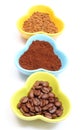 Grains, ground and instant coffee in colorful cups
