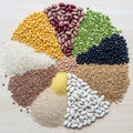 Grains and legumes are arranged in a circular pattern on a wooden Royalty Free Stock Photo