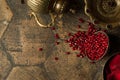 Grains of pomegranate on old paving stones Royalty Free Stock Photo