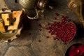 Grains of pomegranate on old paving stones Royalty Free Stock Photo