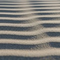 The grains of sand are fine capturing subtle glints of light Royalty Free Stock Photo