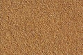 Grains of wheat as background, top view. Agriculture texture image
