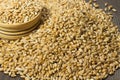 Grains of wheat in a box on table closeup