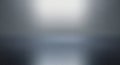 Grainy Grey Gradient Background with Diffused Light Royalty Free Stock Photo