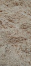 Grainy textured sawdust with empty full frame pattern.
