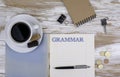 Grammar - Copybook on the desktop. Royalty Free Stock Photo