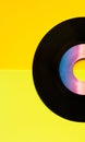 Gramophone vinyl disc retro, vintage style in happy yellow colors Royalty Free Stock Photo