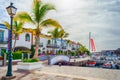 Gran Canaria Spain. December 6, 2018. Gran Canaria streets. Beautiful, vibrant multi-colored houses and palm trees in a seashore