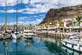 Gran Canaria, Spain - Feb 21, 2023: Colorful canarian fishing boats at the harbor in Puerto de Mogan, Gran Canaria,Spain Royalty Free Stock Photo