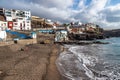 Gran Canaria, Spain - Feb 24, 2023: Puerto de Sardina - fishing village in Grand Canary. Scene with old colorful boats