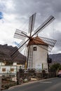 Gran Canaria, Spain - Feb 21, 2023: Traditional old wind mill Molino de Viento near Mogan, Gran Canaria island, Spain Royalty Free Stock Photo