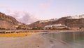 Gran Canaria, Spain. Long exposure panoramic photo during sunset on Amadores beach, smooth silky water