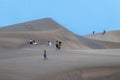 Walking through Maspalomas dunes at sunset