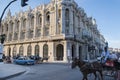 Grand theater of Havana, Cuba with horse drawn carriage in front