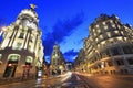 Gran VÃÂ­ailluminated at dusk, an upscale shopping street located in central Madrid Royalty Free Stock Photo