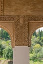 Granada, Andalusia / Spain - September 13, 2019: Alhambra. Gardens of Generalife. Fragment of wall with windows in Moorish style Royalty Free Stock Photo