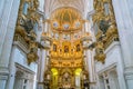 Majestic main altar in `Our Lady of the Assumption` Cathedral in Granada. Andalusia, Spain.