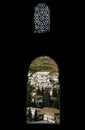 Granada through Moorish windows of Nasrid Palace Royalty Free Stock Photo