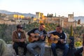 Group of Gypsy musicians performing flamenco art at the famous Mirador de San Nicolas, Granada