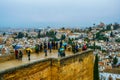 GRANADA, SPAIN, JANUARY 3, 2016: People are enjoying view over Granada from Alhambra palace in spain....IMAGE Royalty Free Stock Photo