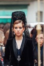 Granada, Spain, March 28, 2013. Women dressed in black dress and mantilla during holy week. Royalty Free Stock Photo