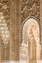 Granada, Spain - May 10, 2018: finely chiseled archs within the city of the Alhambra