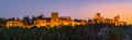 Granada, Spain. October 17th, 2020. View at sunset from below of the buildings and towers of the Alhambra illuminated