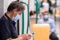 People wearing surgical mask in the train during the Covid-19 pandemic Royalty Free Stock Photo