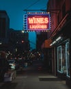 Granada Wines and Spirits vintage neon sign at night in Cobble Hill, Brooklyn, New York