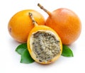 Granadilla with leaves and passion fruit half isolated on a white background Royalty Free Stock Photo