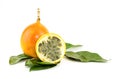 Granadilla whole and a half of fruit sweetly sour filling freshens on green leaves Royalty Free Stock Photo