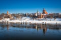 Granaries of Grudziadz city reflected in the Vistula river at snowy winter. Poland Royalty Free Stock Photo