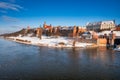 Granaries of Grudziadz city reflected in the Vistula river at snowy winter. Poland Royalty Free Stock Photo