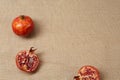 Granat Apple lying on a sackcloth surface Royalty Free Stock Photo