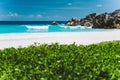 Grand Anse beach, with blue colored deep waves at La Digue Island, Seychelles