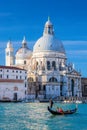 Grand Canal with gondola against Basilica Santa Maria della Salute in Venice, Italy Royalty Free Stock Photo