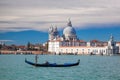 Grand Canal with gondola against Basilica Santa Maria della Salute in Venice, Italy Royalty Free Stock Photo