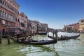 The Grand canal and gondolas with tourists, Venice