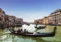 The Grand canal and gondolas with tourists, Venice,