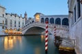 The Grand Canal and Rialto bridge with people, evening in Venice Royalty Free Stock Photo